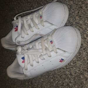 All white adidas shoes